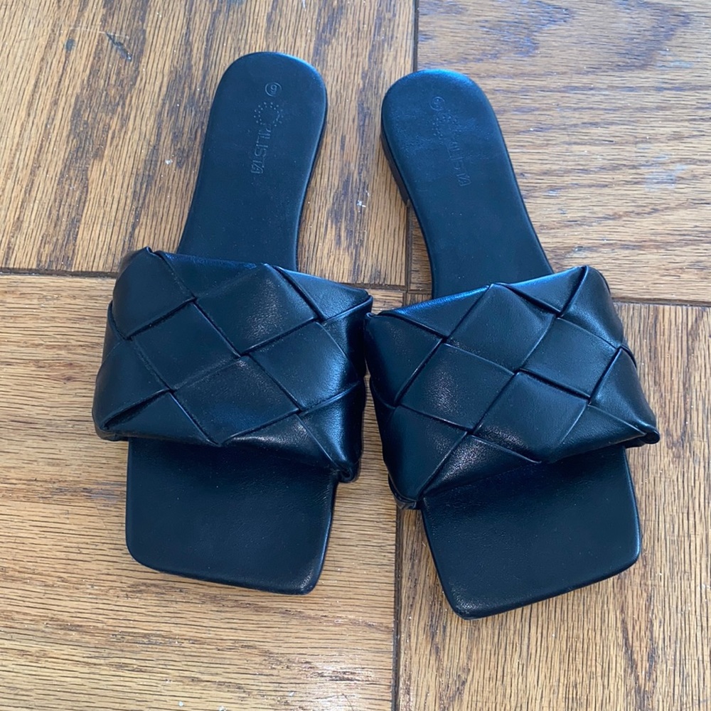 Black woven sandals